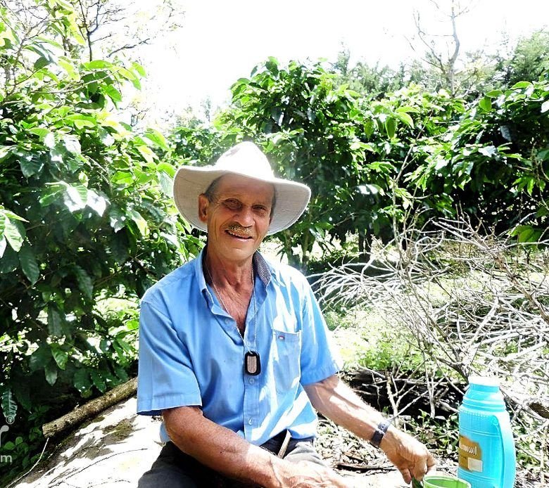Roger Villalobos resting at Finca La Neblina with his coffee thermos